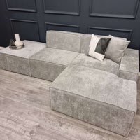 Atlanta Modula Sofa - Corner Combination by Furnish 365 Limited, showcasing a stylish grey modular design with soft textured fabric, perfect for modern living spaces.