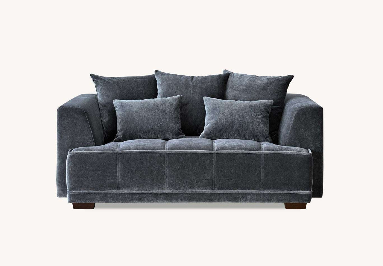 Front view of the Aluxo Gramercy Group sofa in Steel Velvet, highlighting its luxurious comfort and elegant finish.