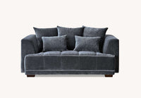 Front view of the Aluxo Gramercy Group sofa in Steel Velvet, highlighting its luxurious comfort and elegant finish.