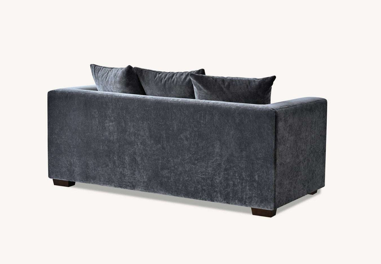 Back view of the Aluxo Gramercy Group sofa in Steel Velvet, showcasing its sleek silhouette and soft upholstery.