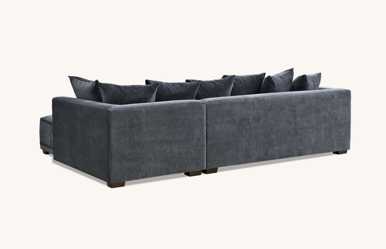 Aluxo Gramercy Group sofa in steel velvet, showcasing the back view and plush cushions, designed for comfort and style.