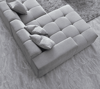 Aluxo Leonard Left Hand Corner Group in Cloudy Grey Boucle set in a modern living room environment.