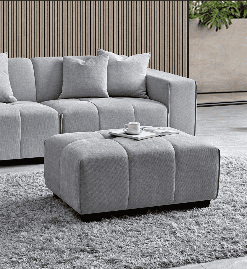 Cozy setup featuring the Aluxo Leonard Left Hand Corner Group in Cloudy Grey Boucle with decorative throw pillows.