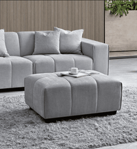 Cozy setup featuring the Aluxo Leonard Left Hand Corner Group in Cloudy Grey Boucle with decorative throw pillows.