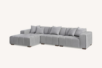 Close-up of the Aluxo Leonard Left Hand Corner Group in Cloudy Grey Boucle showing the soft textured fabric and comfortable seating.