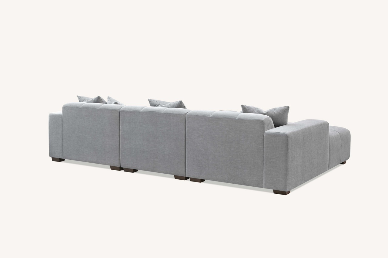 Aluxo Leonard Left Hand Corner Group in Cloudy Grey Boucle displayed in a cozy living room setting.