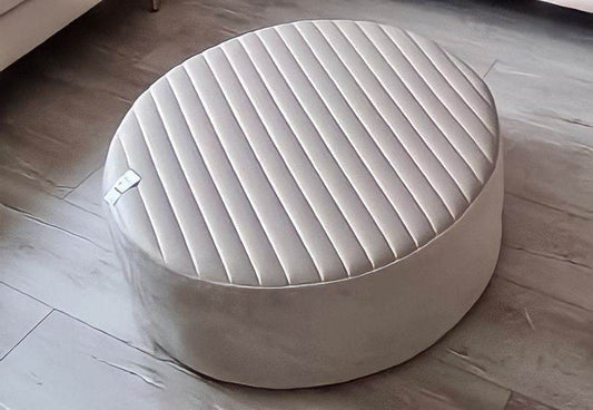 Soft cream velvet rounded Brooklyn footstool by LISF LTD., featuring a stylish striped design, perfect for adding a modern touch to any space. Ideal for the BLACKFRIDAY23 sale. A must-have footstools item!