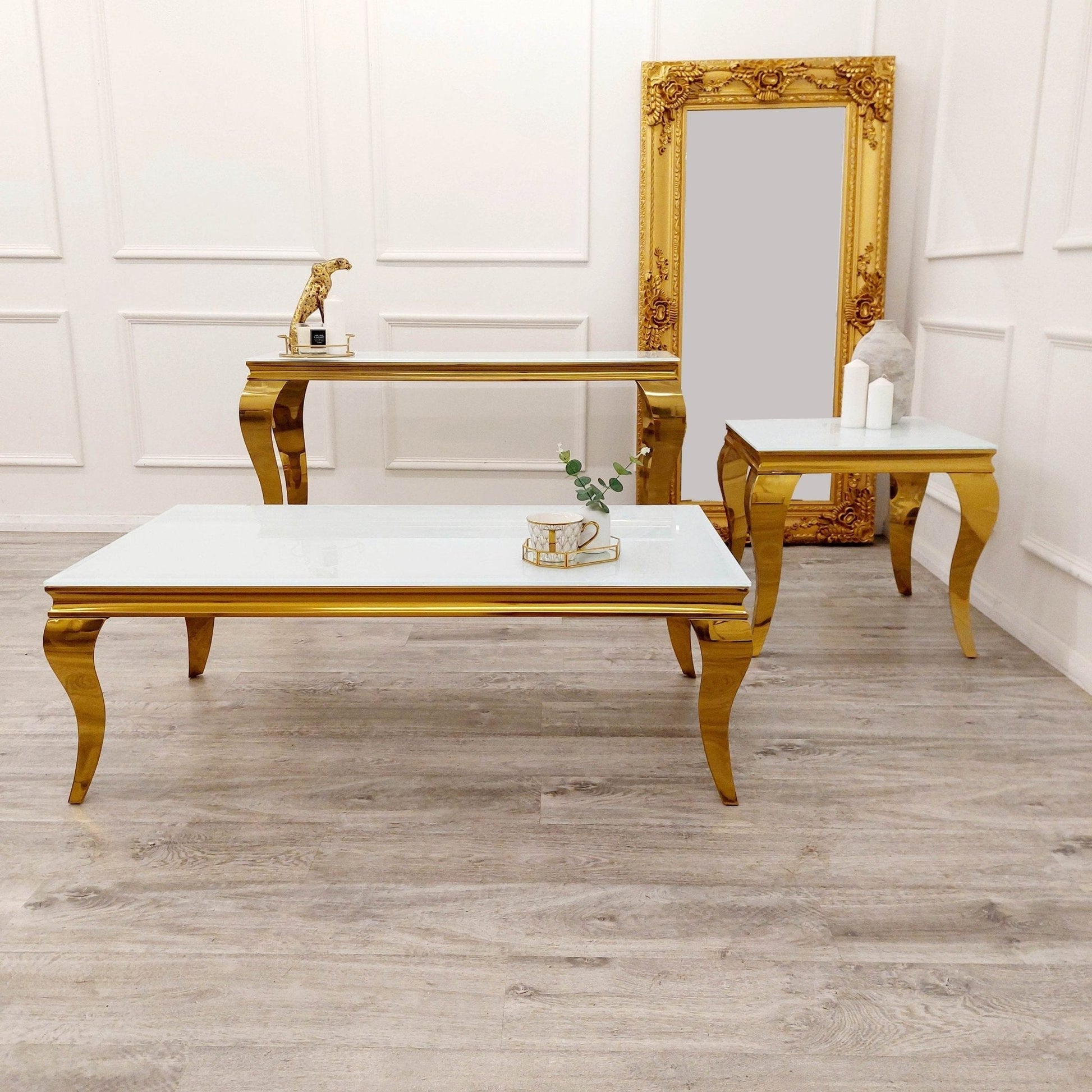 Stylish living space featuring the Louis Gold Console Table by Furnish 365 Limited paired with matching coffee and side tables in an elegant setting.