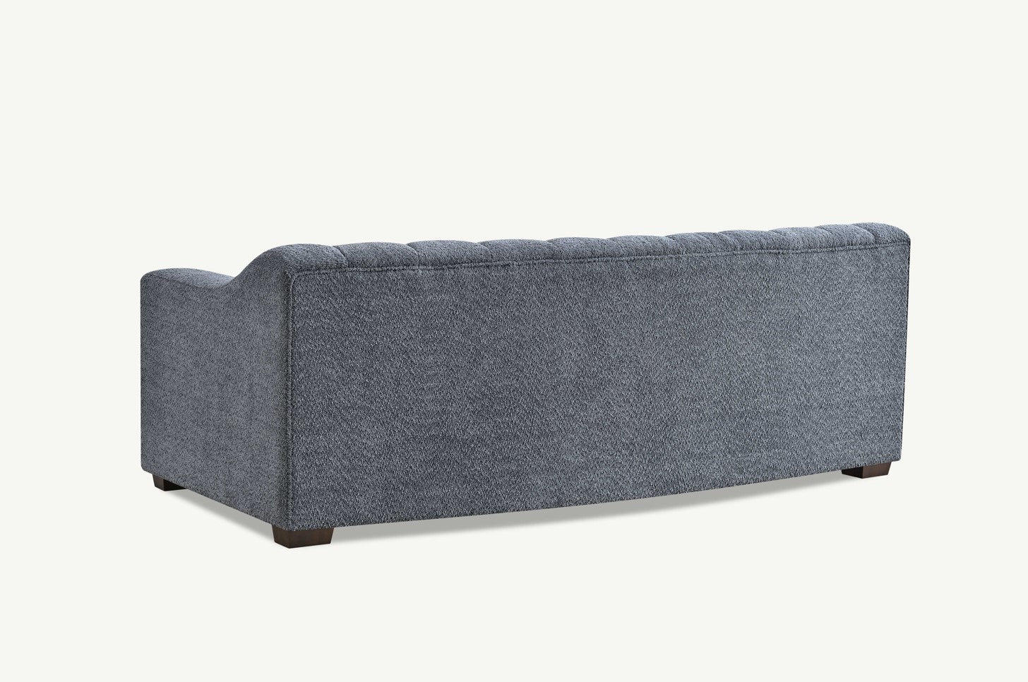 Aluxo Astoria 3 Seater Sofa in Iron Boucle Fabric - UK Luxury FurnitureAluxo Astoria 3 Seater Sofa in Iron Boucle FabricSofasAluxoUK Luxury Furniture8746763183897150952736538971The back view of the Aluxo Astoria 3 Seater Sofa in Iron Boucle Fabric, showcasing its beautiful deep channel stitching and luxurious design. Ideal for adding elegance to any living space. Luxury Furniture.