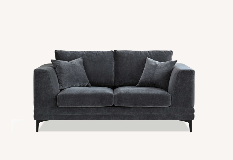 Front view of the Aluxo Lenox Sofa Range in Steel Velvet with soft cushions, set against a light neutral background.