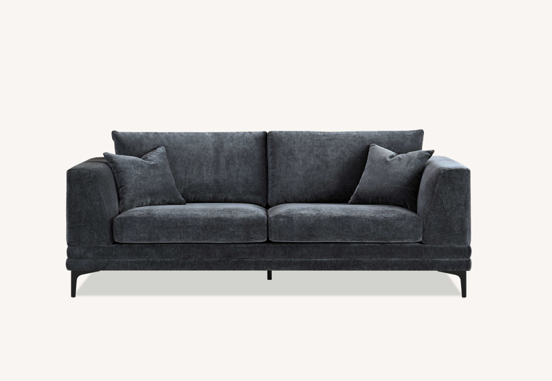 Stylish front view of the Aluxo Lenox Sofa Range in Steel Velvet featuring deep seats and soft back cushions.