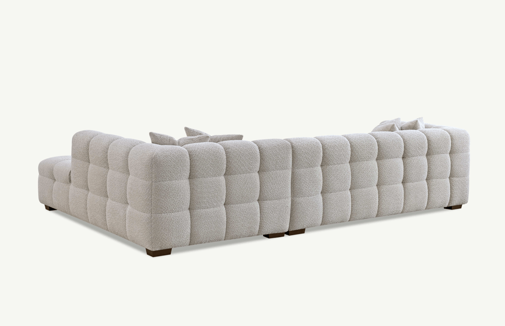 Aluxo Tribeca Right Hand Corner Group in Oatmeal Boucle Fabric - UK Luxury FurnitureAluxo Tribeca Right Hand Corner Group in Oatmeal Boucle FabricSofasAluxoUK Luxury Furniture8746763773429950952750334299Back view of the Aluxo Tribeca Right Hand Corner Group in Oatmeal Boucle Fabric, showcasing its deep channel stitching and plush texture.