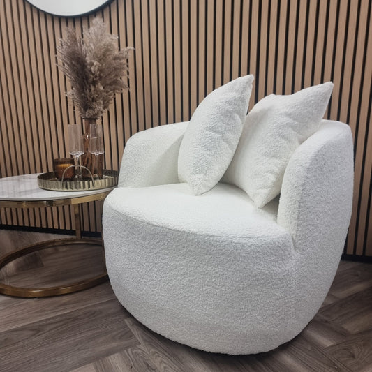 Cuddle Accent Chair - UK Luxury FurnitureCuddle Accent ChairSofasFurnish 365 LimitedUK Luxury Furniture8746763294351550952734343515Cuddle Accent Chair by Furnish 365 Limited featuring luxurious boucle fabric, showcasing its plush design and comfort in a stylish room setting.