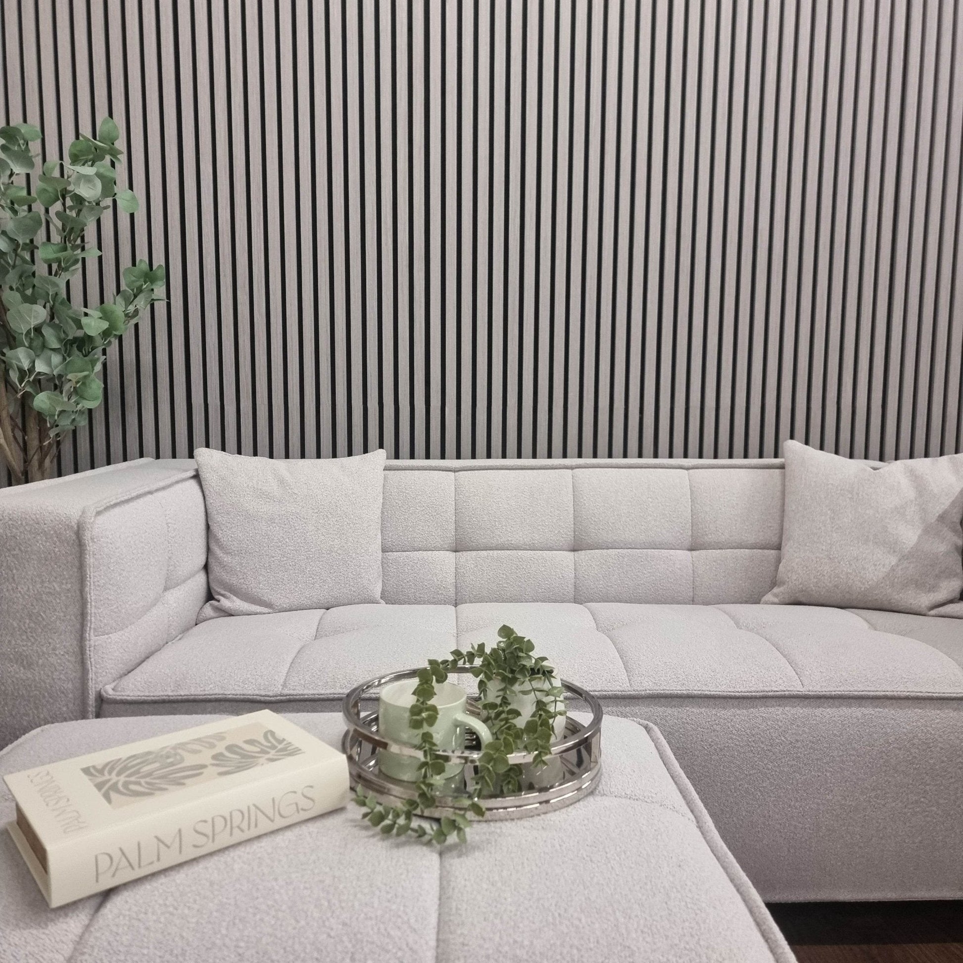 Contemporary corner couch paired with Acoustic Wood Slatted Wall Panels by Furnish 365 Limited, highlighting luxury furniture and adding elegance to the setting.