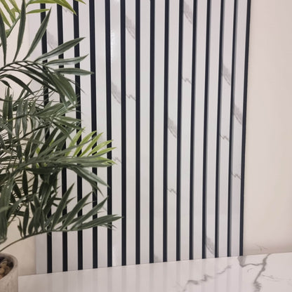 Stylish installation of Acoustic Wood Slatted Wall Panels by Furnish 365 Limited, set against a modern background, perfect for luxury furniture setups.