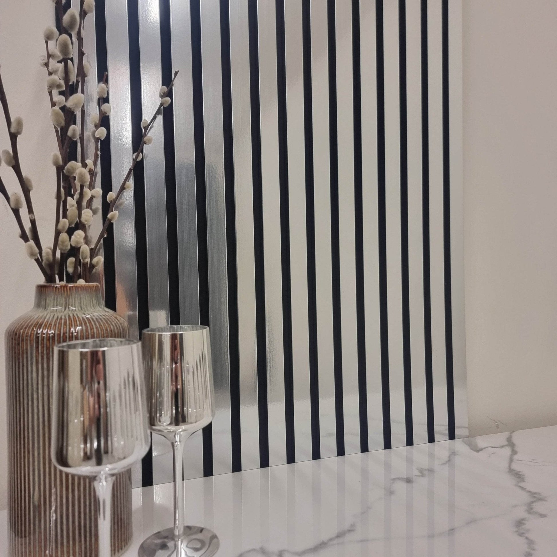 Elegant Acoustic Wood Slatted Wall Panel from Furnish 365 Limited with sleek silver slats, combining modern design with the functionality of luxury furniture.